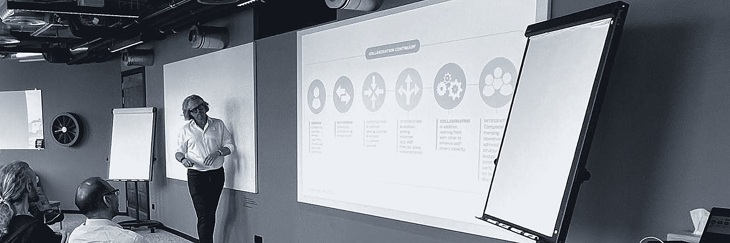 Dave presenting a collaboration continuum to a workshop group